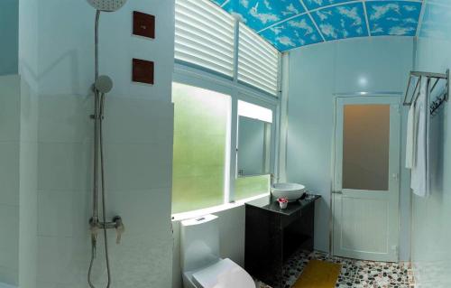 Phòng tắm tại Le Huynh Mui Ne Hotel