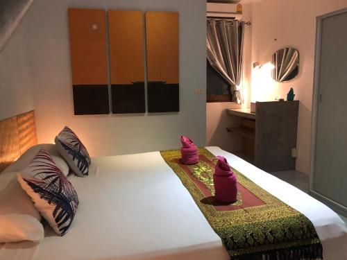 Postel nebo postele na pokoji v ubytování Samui Zenity