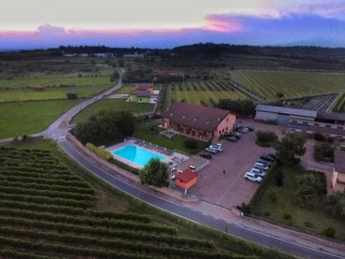an aerial view of a farm with a pool at Agriturismo Ca' Del Gal in Valeggio sul Mincio