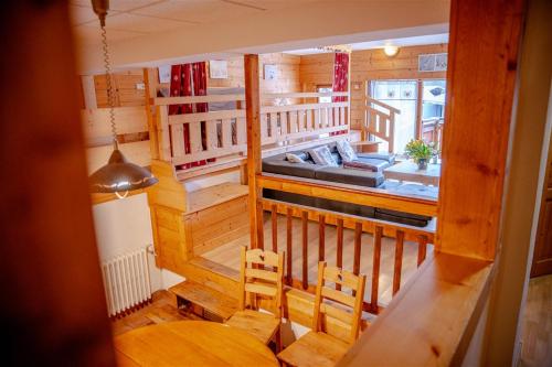 an overhead view of a room with a bed and chairs at Le Mont Blanc (Gite Des Alpes) in La Giettaz