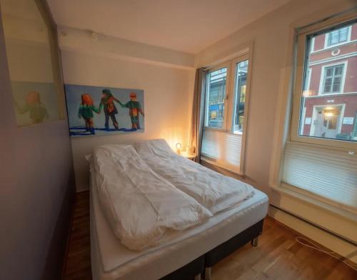 Kama o mga kama sa kuwarto sa Nice, Modern Apartment in Central Bergen