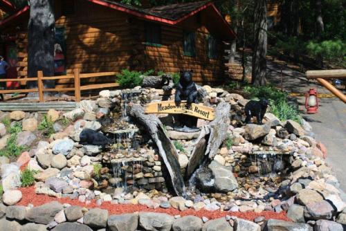 a model of a rock garden with bears in a pond at Meadowbrook Resort in Wisconsin Dells