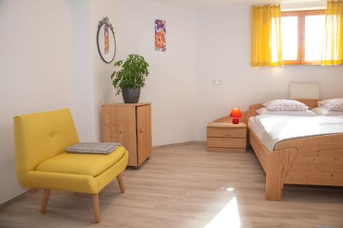 Ένα ή περισσότερα κρεβάτια σε δωμάτιο στο Apartments Rožič Bohinj