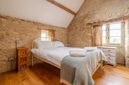 Postel nebo postele na pokoji v ubytování Middle Barn