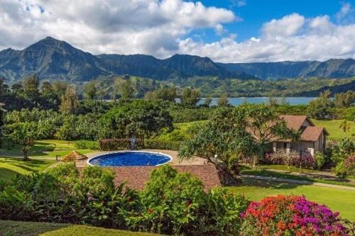 an aerial view of a yard with a swimming pool at Hanalei Bay Resort 6101 condo in Princeville