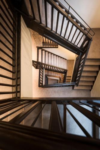 a view of a spiral staircase in a building at Altstadthotel Weisses Kreuz in Innsbruck