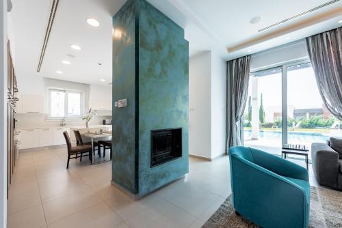 Χώρος καθιστικού στο Villa Dione by Ruidoso Luxury