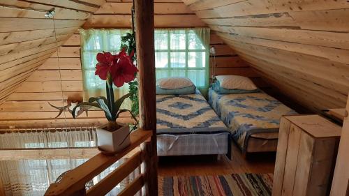 Postel nebo postele na pokoji v ubytování Nõva Madise Guesthouse