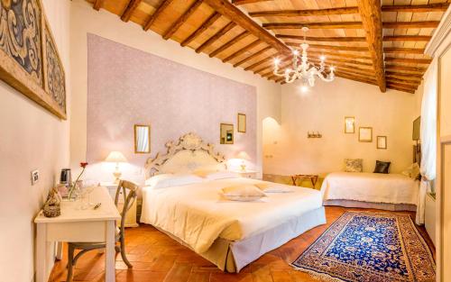 Katil atau katil-katil dalam bilik di Agriturismo Il Segreto di Pietrafitta