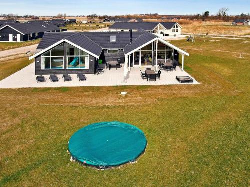 an overhead view of a house with a large backyard at 14 person holiday home in Idestrup in Marielyst