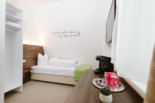Postel nebo postele na pokoji v ubytování Velden24 - create your own stay