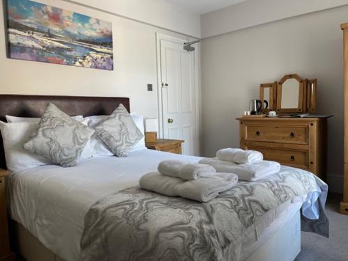 Postel nebo postele na pokoji v ubytování Tynycornel Hotel