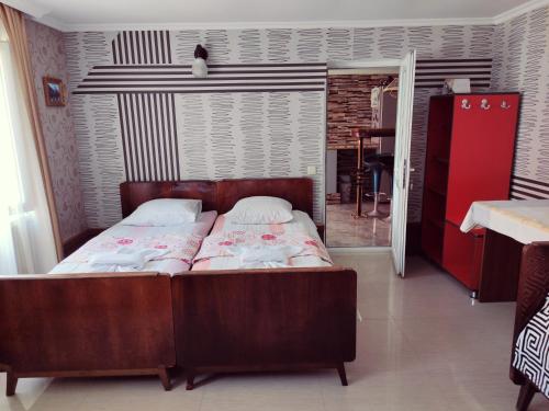 Кровать или кровати в номере Guest House on Kostava 23