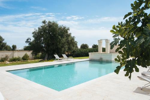 Swimmingpoolen hos eller tæt på Masseria Torremossa