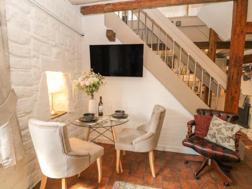 TV a/nebo společenská místnost v ubytování Archway Cottage