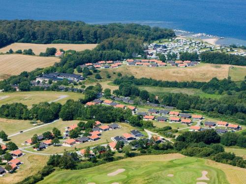 an aerial view of a village with a golf course at 5 person holiday home on a holiday park in Aabenraa in Aabenraa
