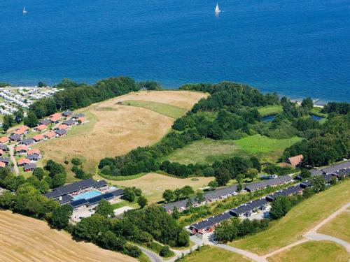 an aerial view of a parking lot next to the ocean at 5 person holiday home on a holiday park in Aabenraa in Aabenraa