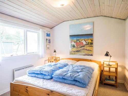 Кровать или кровати в номере Holiday home Blåvand CXXVII