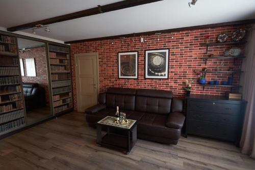 Гостиная зона в Apartment on Pobeda 4 with sauna