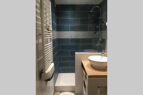 Ванная комната в Studio 24 - Coucher de Soleil & Vue Mer