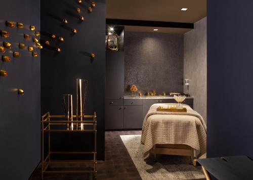 a bedroom with a bed and a kitchen at Grand Hyatt Nashville in Nashville