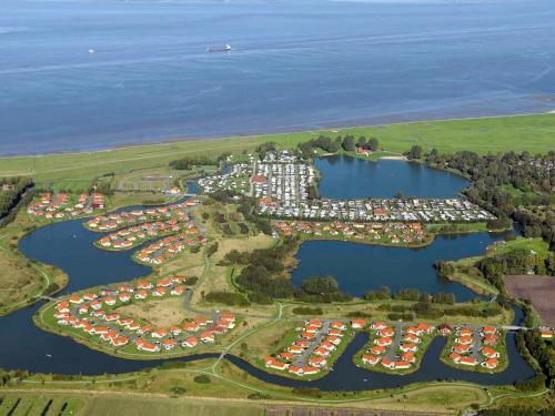 an aerial view of a marina with a bunch of boats at 6 person holiday home in Otterndorf in Otterndorf