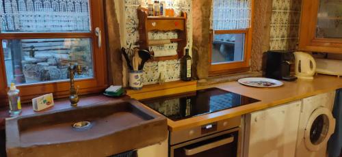 Köök või kööginurk majutusasutuses Gîte Les Cerisiers