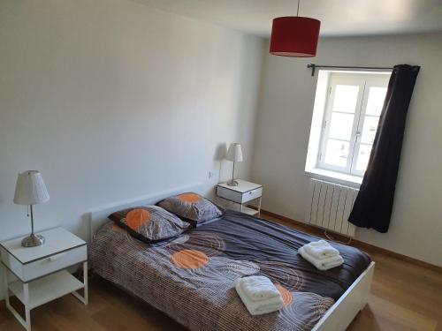 Кровать или кровати в номере Appartement en plein centre de Deauville 2éme