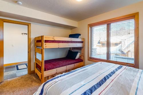 a bedroom with two bunk beds and a window at Northwest Passage Retreat in Sandpoint