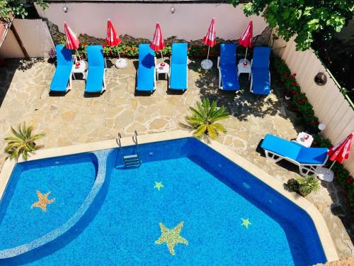 A view of the pool at Plovdiv Hotel or nearby