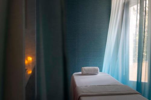 Кровать или кровати в номере Victoria Palace Hotel
