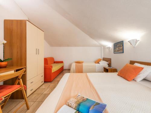 Postel nebo postele na pokoji v ubytování Bed and Breakfast Dorgali