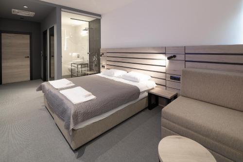 Кровать или кровати в номере Super seven inn