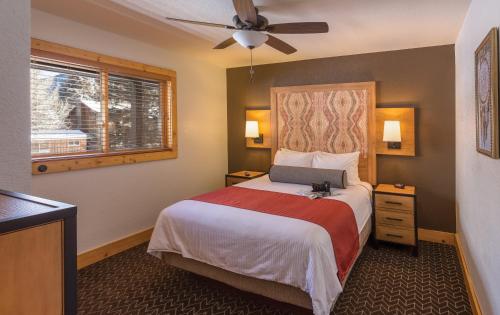A bed or beds in a room at WorldMark Red River