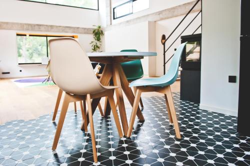 a dining room with a table and two chairs at Casa Encina in Murcia