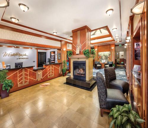 a lobby of a hotel with a fireplace at WorldMark San Diego - Balboa Park in San Diego