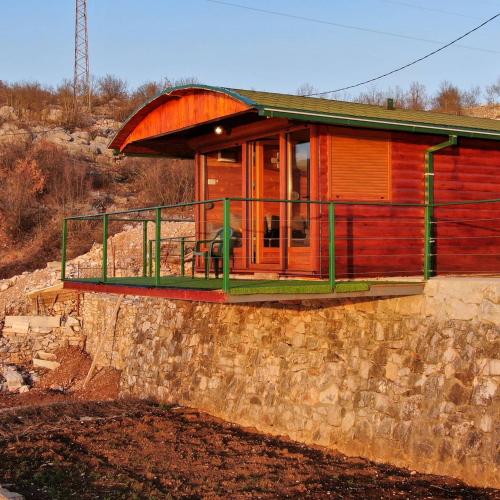 a house that is on top of a wall at Studio apartment Dunja in Nikšić