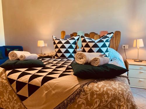 Posteľ alebo postele v izbe v ubytovaní Casa Batella