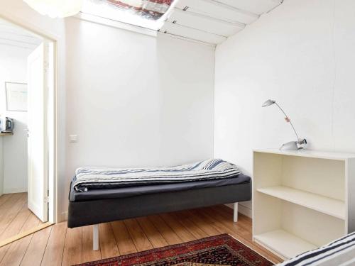 Postel nebo postele na pokoji v ubytování Holiday Home Hamngatan