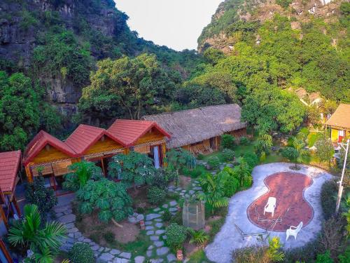 an aerial view of a house in a mountain at Green Mountain Homestay in Ninh Binh