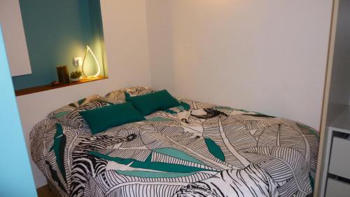 Postel nebo postele na pokoji v ubytování Appartement tout équipé avec piscine proche Stade OL et EUREXPO