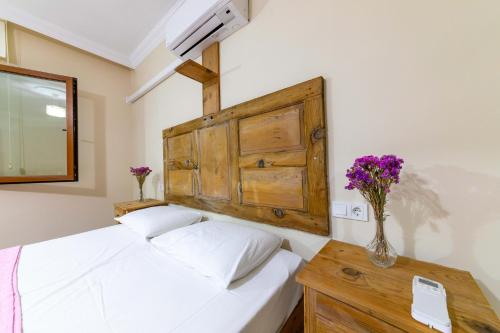 Ένα ή περισσότερα κρεβάτια σε δωμάτιο στο Villa Jasmin Selimiye -with pool Daily Weekly Rentals