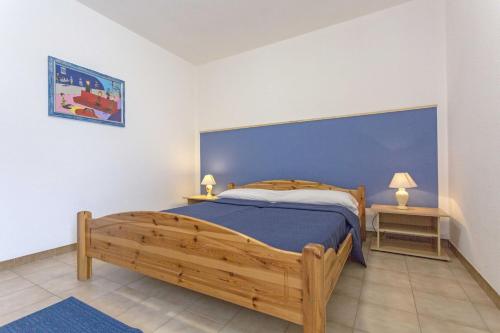 Postel nebo postele na pokoji v ubytování Gallipoli a due passi Residence