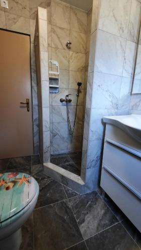 Koupelna v ubytování Apartment PinoAppLosinj