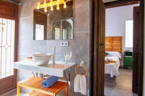 Ванна кімната в La Casa Gris Boutique Home
