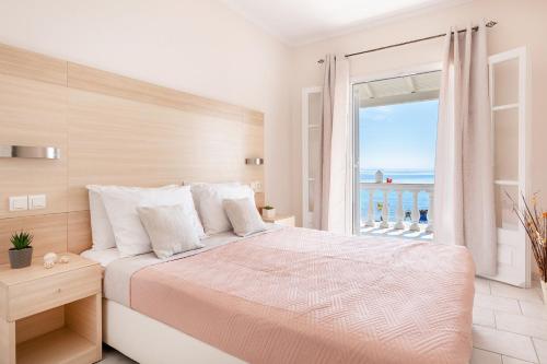 Postel nebo postele na pokoji v ubytování Albatross Apartments by Konnect, Ipsos Corfu