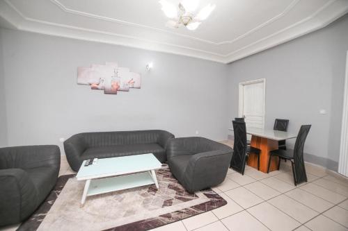 Χώρος καθιστικού στο Les Residences de la providence-Appart Hotel Obobogo