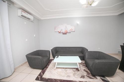 Χώρος καθιστικού στο Les Residences de la providence-Appart Hotel Obobogo