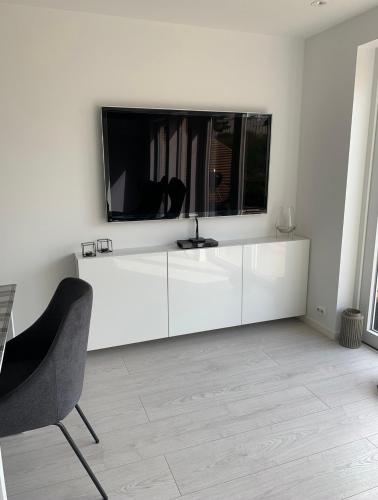 TV i/ili multimedijalni sistem u objektu Årostunet 3