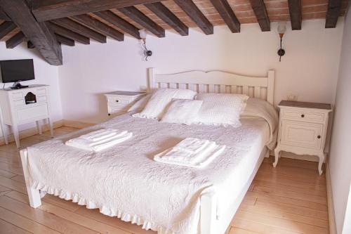 Katil atau katil-katil dalam bilik di Casa MYCONIS 68Mq a due passi dal Mare di San Vincenzo